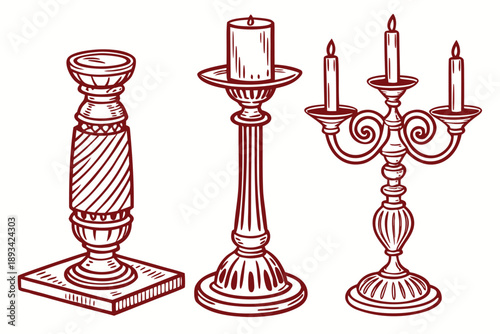 Three vintage candle holders including a striped pillar stand.