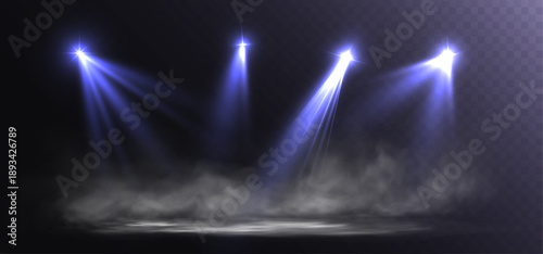 Light blue stage spotlights with glowing beams and smoke on dark background.
