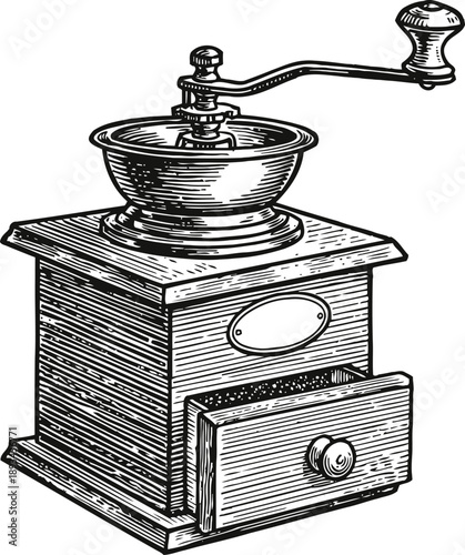 Vintage manual coffee grinder with crank handle and small drawer detailed engraving
