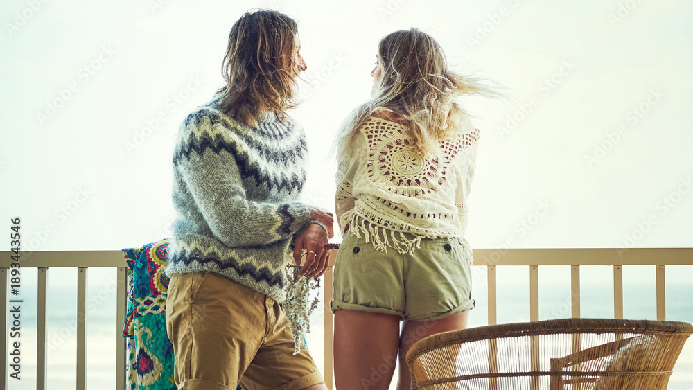Fototapeta premium Back, couple and thinking on balcony outdoor with love, calm morning and reflection on holiday. Thoughts, people and terrace for fresh air, daydreaming and bonding together in nature at vacation home