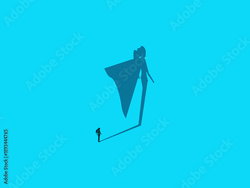 businesswoman and her own shadow as a hero