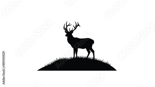 a striking black deer silhouette stands atop a grassy hill against a white background