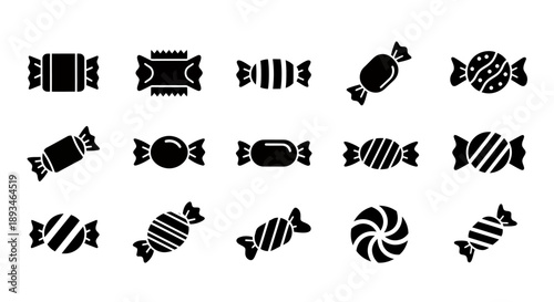 Collection of various wrapped candies, showcasing different shapes and designs, perfect for sweets.