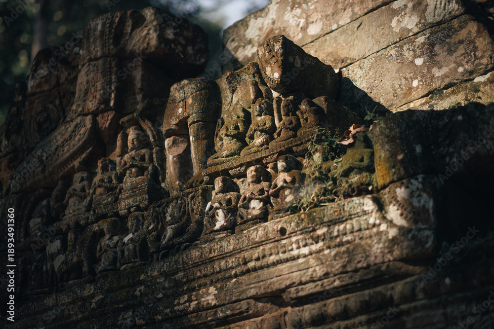 Fototapeta premium Intricate Stone Carvings on Ancient Wall of Ta Som Temple in Cambodia
