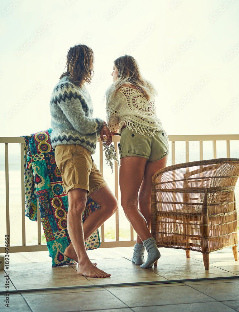 Fototapeta premium Thinking, couple and relax on patio outdoor with love, calm morning and reflection on holiday. Thoughts, people or terrace for fresh air, daydreaming and bonding together with memory at vacation home