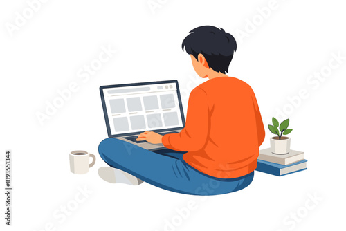Person sitting on the floor working on a laptop with coffee and books nearby in a home setting during daytime
