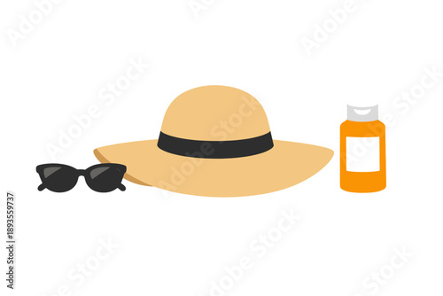 Sun hat, sunglasses, and sunscreen on a table for protection against sun exposure during outdoor activities or beach visits