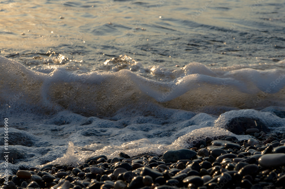 Obraz premium Spalshes of water and sea foam, sea waves, sea foam and water splashes. Abstract background