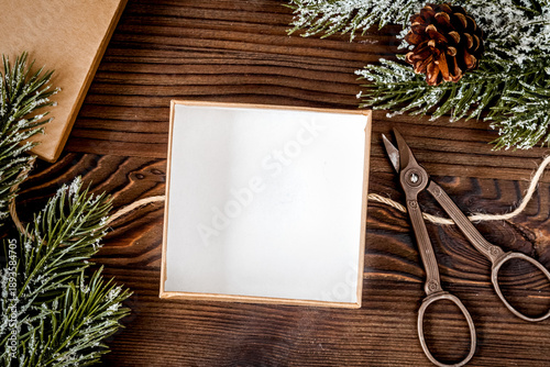 packaging christmas gifts in boxes on wooden background top view
