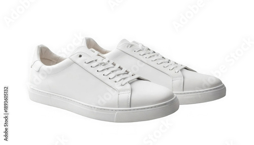 A pair of clean minimalist white leather low top court sneakers with matching laces ready for modern casual wear on transparent background