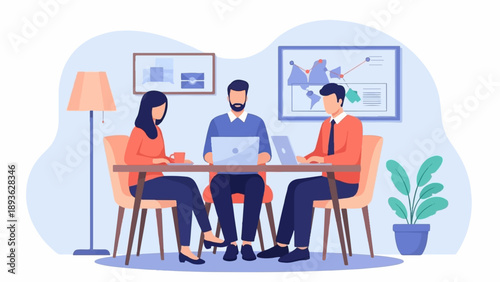 Diverse colleagues collaborate at laptops in an office meeting