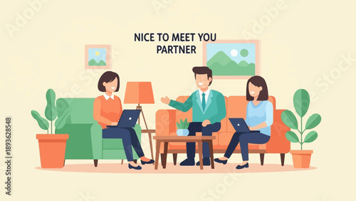 Diverse colleagues collaborate on laptops in a cozy indoor setting