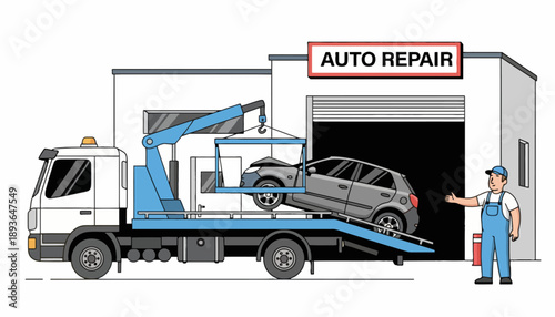 Mechanic guides car onto tow truck at auto repair garage