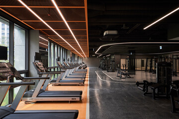 Fotobehang Fitness Loopbanden in luxe high-tech gym  © Namsun