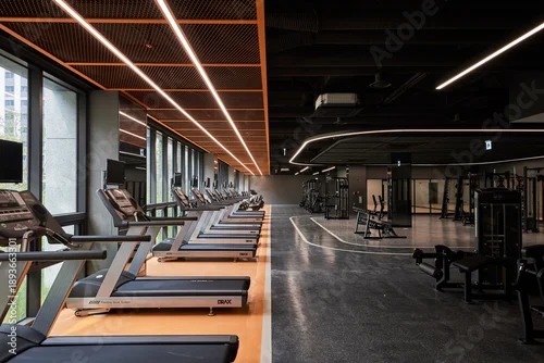 Panel kuchenny z motywem Rows of treadmills in a luxury high-tech fitness center gym