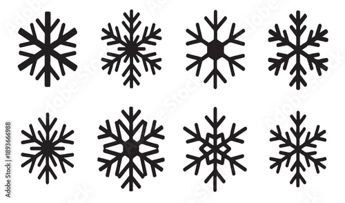 Wallpaper Mural A set of eight black and white snowflake designs
arranged in two rows of four. The snowflakes are rendered in a minimalist, geometric style with clean lines and sharp edges Torontodigital.ca