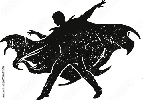 Silhouette of male flamenco dancer striking dynamic pose with flowing cape and extended arms