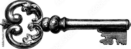 Ornate vintage metal key with botanical handle design