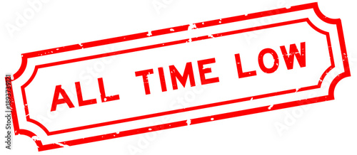 Grunge red all time low word rubber seal stamp on white background