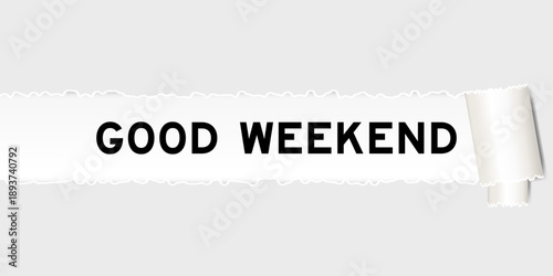 Ripped gray paper background that have word good weekend under torn part