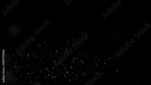 Abstract burning cinders flying through the air during an inferno.