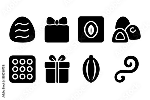 Luxury Chocolate Icons. Luxury chocolates. Filled icon set of Luxury chocolates: gourmet truffle, gold-wrapped