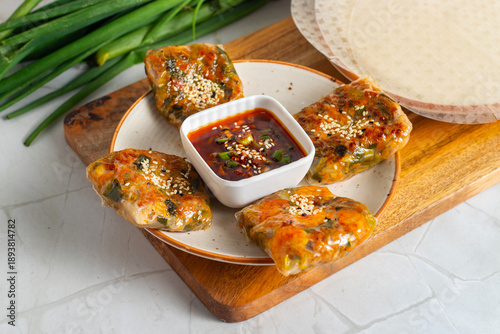Photography Rice paper wraps are light Vietnamese rolls filled with fresh vegetables herbs noodles and proteins wrapped delicately for a refreshing healthy meal