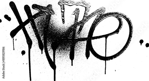 Graffiti art spray painted tag with drips and splatters.