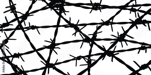 Sharp black barbed wire tangled against a stark white background creating a visual barrier