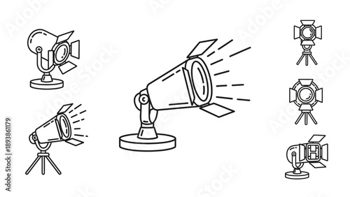 Studio lights on tripod stands.