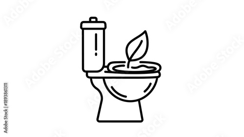 Toilet with a green leaf inside.