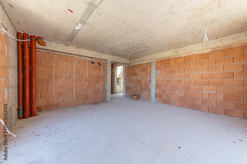 custom made wallpaper toronto digitalEmpty Unfinished Interior Room in New Residential Building with Exposed Brick Walls and Concrete Ceiling, Real Estate Construction Site Ready for Renovation and Design Planning