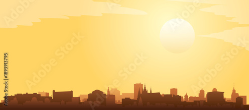 Golden yellow panoramic poster of the city skyline with misty background buildings and clouds of PRAGUE, CZECH REPUBLIC
