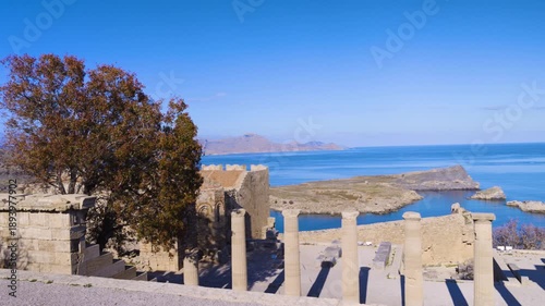 Pan Across Acropolis Temple Ruins and the Aegean Sea Near Lindos in Rhodes, Greece