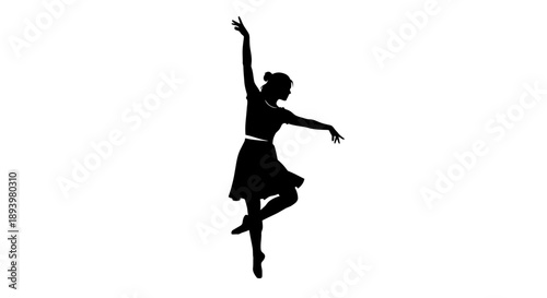 Silhouette of a woman dancing in a studio with her arms raised and skirt flared 