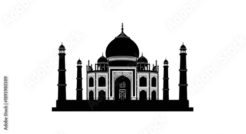 Silhouette of the Taj Mahal monument standing majestically at sunset in India.