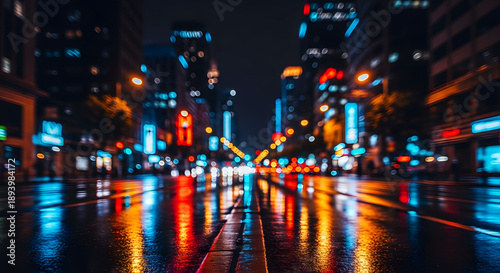Wallpaper Mural Blurry city street at night with colorful lights reflecting on wet pavement Torontodigital.ca