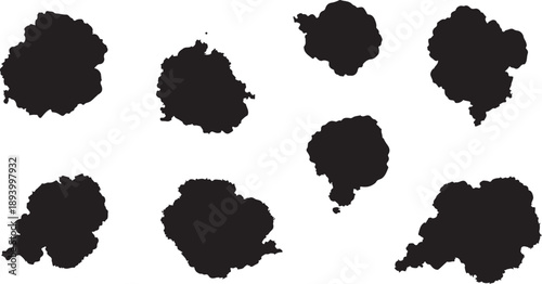 Set of black ink splatters on white background texture
