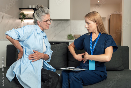Принти на полотні Healthcare professional visits elderly woman at home for medical consultation
