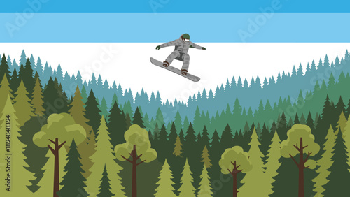 Snowboarder in action above forested mountain terrain