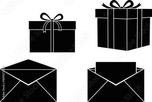 black gift boxes and envelopes on white background