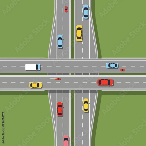 Overhead view of highway interchange with cars driving on asphalt roads