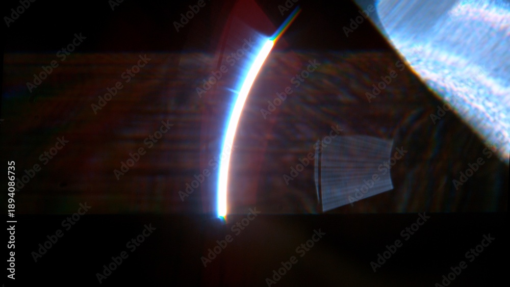 Fototapeta premium Real Lens Flare Reflections for Overlay or Transition Isolated on Black