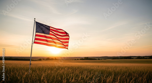 American Flag Waving in Golden Sunset Over Wheat Field