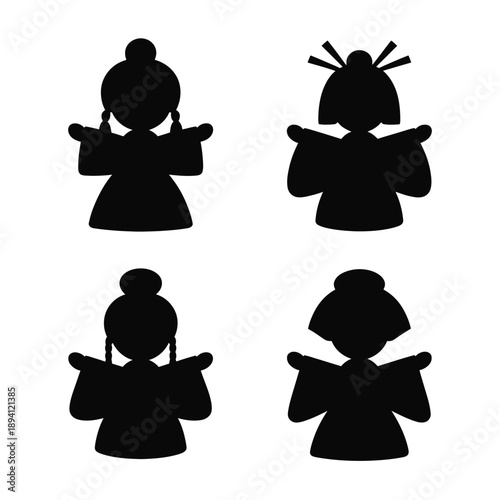 Four Black Silhouettes of Geisha Figures in Traditional Attire
