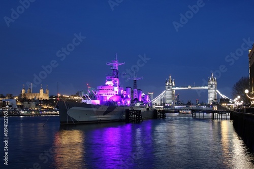 The Tower of London, HMS Belfast, and Tower Bridge by night.