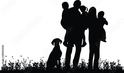 Silhouette of a happy family with three children and their dog standing in a grassy field during a beautiful sunset.