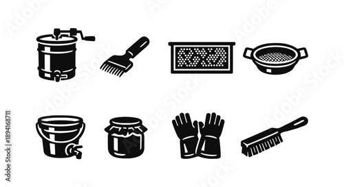 Beekeeping tools: honey extractor, brush, frames, sieve, bucket, jar, gloves, scraper