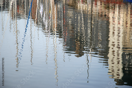 Refelctions in still water of the old harbour, Honfleur, Normandy, France