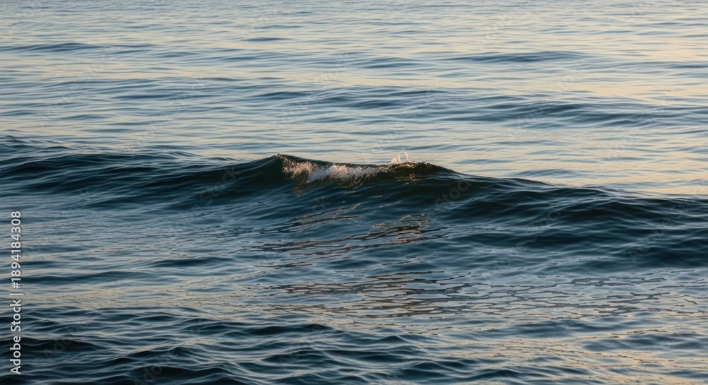 Naklejka premium Ocean waves calm water surface soft light minimalist background